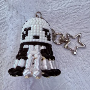 minimalist pixel shuttlecock charm